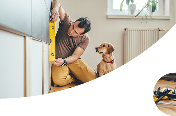 Man and dog doing renovations