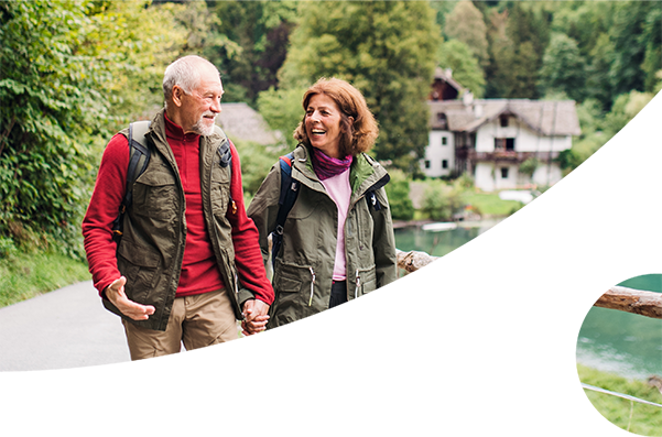 Older couple on a walk next to the lake